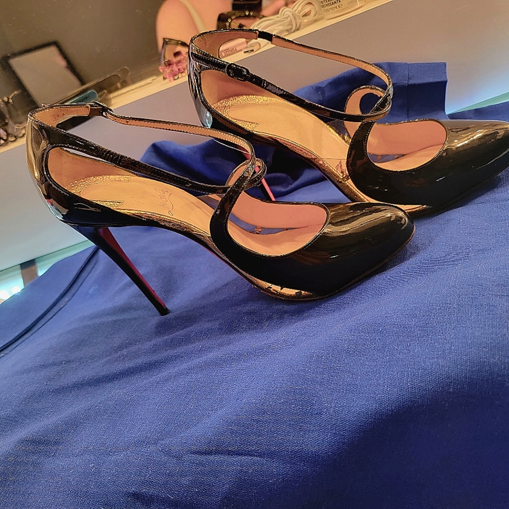 Black and gold Christian Louboutin